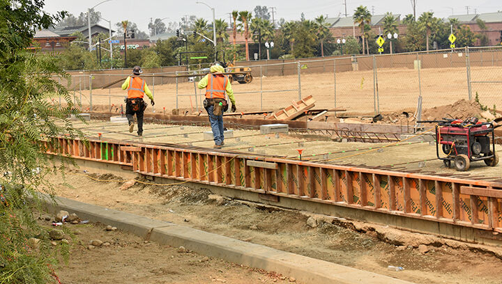 Construction begins on parking garage.